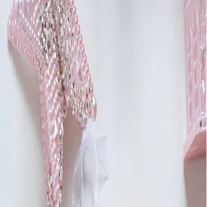 Pink glitter acrylic Christmas tree hanging pendant, sweet style holiday decor detail.