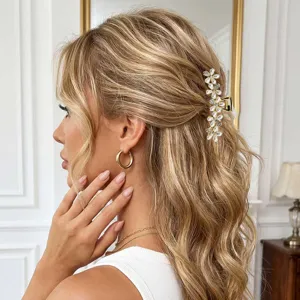 Elegant pearl flower hair claw clip for thick hair, stunning gold metal hair accessory style.