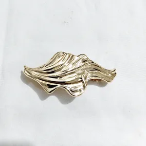 Gold metal hair clip detail, irregular water wave design, retro style barrette for women.