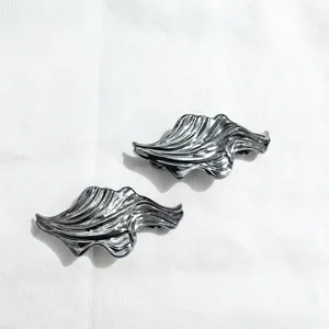 Silver metallic wave hair clip, retro geometric barrette for women daily styling and bun.