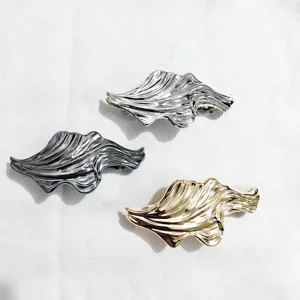 Metal wavy geometric hair clips set, gold silver gunmetal spring barrettes for styling.