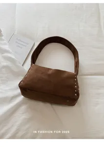 Retro Wildleder Nieten Umhängetasche, schicke Biker Pendlertasche, modisch und vielseitig.