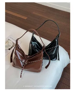 Retro PU leather shoulder bag with chic metal eyelet details, stylish Y2K motorcycle hobo bag.