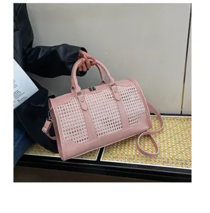Roze holle schoudertas met vintage grote capaciteitsontwerp voor dames casual reizen.