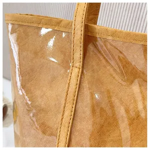 Detaillierte Nahaufnahme der Textur und feinen Nähte der Dupont-Papier PVC Handtasche.