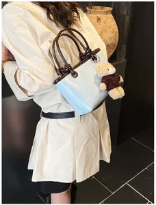 Korean style color block handbag with cute bear pendant, stylish shoulder crossbody bag for women
