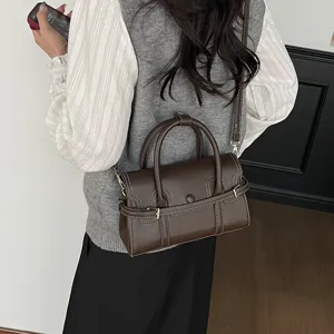 Dames vintage retro handtas en schoudertas met handvat en stijlvolle contrasterende naden.