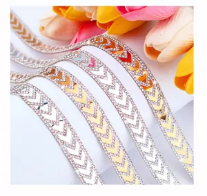 Detail view of self-adhesive rhinestone strip for DIY crafts, sparkling crystal ribbon.