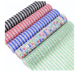 Self-adhesive rhinestone pearl ribbon roll trim for DIY crafts, shoes, and box decoration.