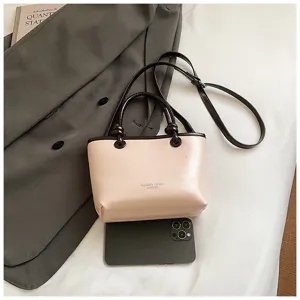 Stylish contrast color handbag for women, versatile shoulder and crossbody bag with chic design.