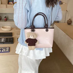 Korean style pink contrast color handbag with cute bear pendant, stylish casual shoulder bag.