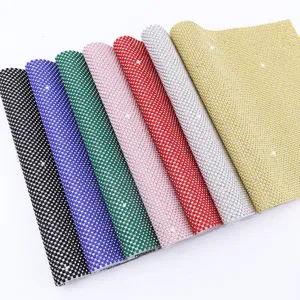 Colorful resin rhinestone mesh hot melt adhesive sheet for DIY apparel decoration and crafts.