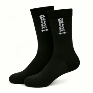 Black wedding groom crew socks with embroidered text and bow tie for men groomsmen.