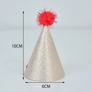 Close-up detail of the gold glitter party hat with red pom-pom and size dimensions shown.