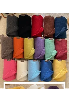 Soft wool knit scarf in multiple colors, cozy winter accessory for women and couples.