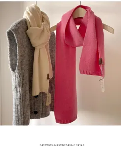 Cozy pure wool knitted scarf for women and men, soft winter neck warmer in elegant colors.