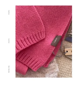 Pink wool knit scarf detail texture closeup winter warm soft neck warmer fashion accessory