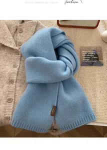 Cozy light blue knitted winter scarf, soft warm wool feel, elegant daily neck warmer.
