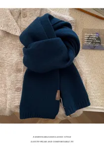 Cozy winter knit scarf for women and men, classic dark blue wool neck warmer for cold days.