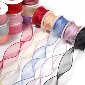 Polyester sheer organza ribbon rolls in vibrant colors, perfect for floral gift wrapping and DIY crafts.
