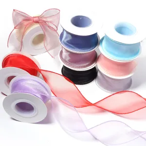 Colorful organza ribbon rolls for gift wrapping, flower bouquets, and DIY crafts decoration.