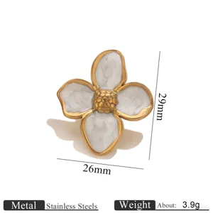 Stainless steel four-petal flower earrings with vintage gold edge and white enamel detail.