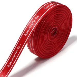 Rode lintrol met witte rand en tekst voor geschenkverpakking en bloemboeket decoratie.