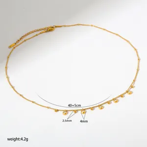Edelstahl Gold Halskette mit funkelnden Zirkonia Anhängern, schickes und elegantes Schmuckstück.