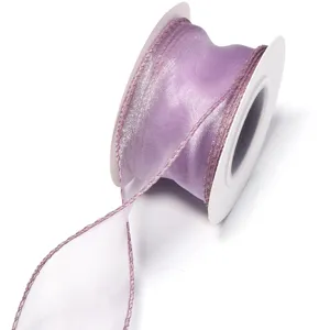 Purple sheer organza ribbon roll with finished edges, ideal for gift wrapping and DIY crafts.