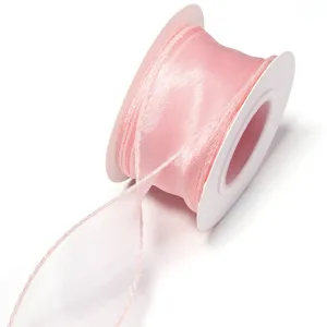 Pink organza ribbon roll for gift wrapping, flower bouquet decoration, and DIY bow hair accessories.