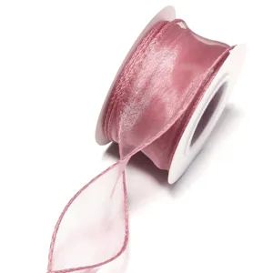 Pink sheer organza ribbon roll for gift wrapping, floral packaging, and DIY crafts. Perfect.