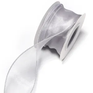 Silver sheer organza ribbon close-up, wired edge fishtail yarn for gift wrapping and DIY bows.