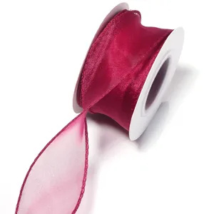 Dark pink organza ribbon detail, sheer polyester fabric, decorative craft bow accent.