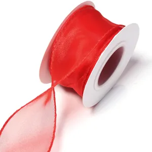 Red sheer organza ribbon spool detail showing fine texture for gift packaging and DIY crafts.