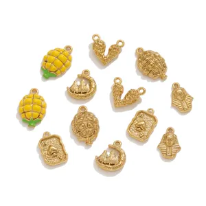 Gold plated stainless steel DIY jewelry pendants set with various vintage embossed charms.