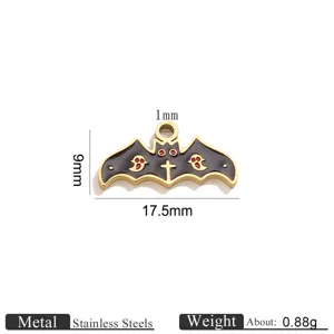 Close-up detail of the stainless steel bat ghost charm, showing fine enamel and cross pattern texture.