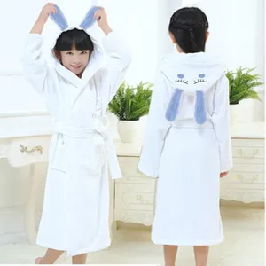 Kids white cotton bathrobe featuring cute blue bunny ears, long sleeves and belt for home wear.