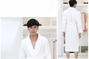Detailed view of the white cotton Terry bathrobe showing front and back fit, soft and absorbent.