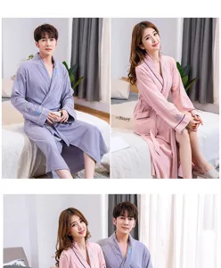 Detail view of cotton couple bathrobes featuring soft fabric and delicate embroidery designs.