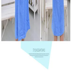 Blue cotton towel bathrobe detail view, soft absorbent fabric for cozy relaxing moments.