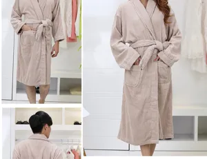 Close-up details of thick cotton towel bathrobe, cozy long sleeves, adjustable waist belt.