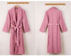 Pink cotton bathrobe detail view, featuring long sleeves, belt, and shawl collar design.
