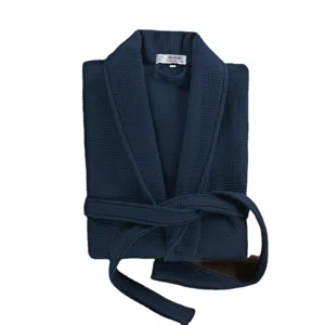 Deep blue cotton waffle knit bathrobe, cozy thickened sleepwear with belt, folded main view.