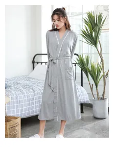 Grey long bamboo fiber bathrobe with white trim and waist belt for comfortable loungewear.