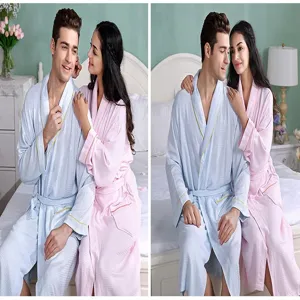 Soft breathable couple waffle bathrobes in bedroom scene showing comfortable homewear detail.
