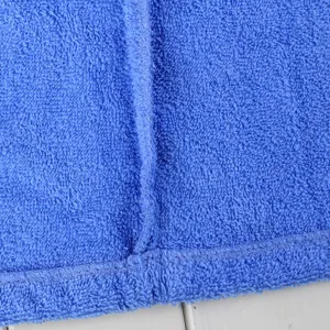 Pure cotton terry cloth bathrobe fabric detail close up showing soft thick texture