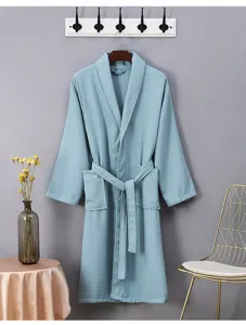 Lightweight waffle weave hotel bathrobe detail showcasing breathable texture and comfy.