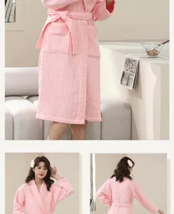 Pink waffle knit cotton bathrobe with waist belt and front pockets detail view for spa and home.