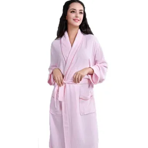 Pink waffle knit bathrobe for women, absorbent sleepwear for home, soft loungewear.