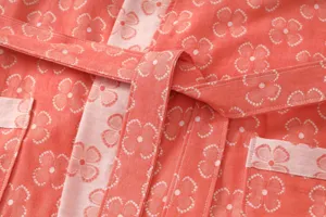 Double layer gauze cotton bathrobe detail shot, coral pink floral sleepwear belt pocket.